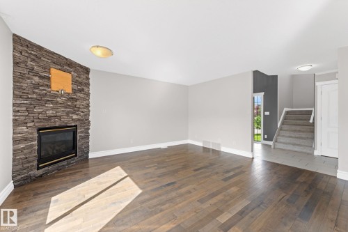 173 Castle Drive Nw, Edmonton, AB - Indoor With Fireplace