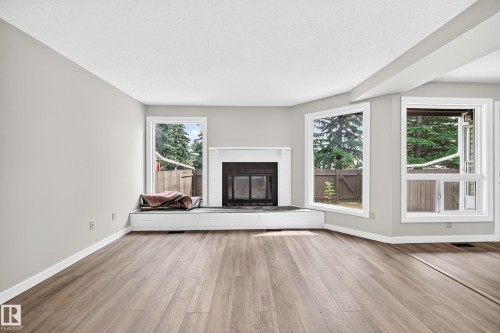 #6 1820 56 St Nw, Edmonton, AB - Indoor Photo Showing Living Room With Fireplace