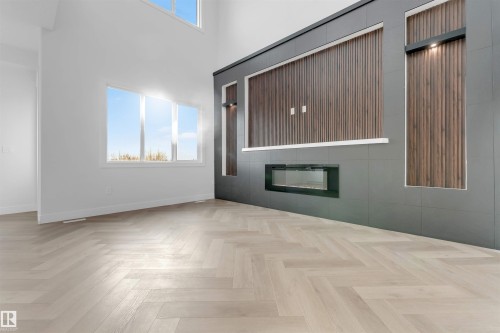 13136 187 Avenue Nw, Edmonton, AB - Indoor Photo Showing Other Room With Fireplace