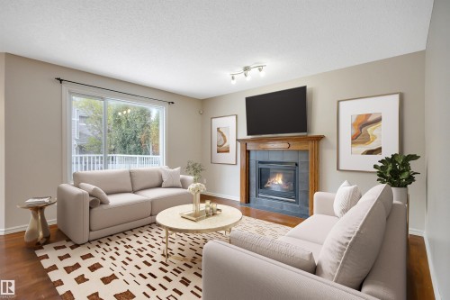 3080 Spence Wynd Sw, Edmonton, AB - Indoor Photo Showing Living Room With Fireplace