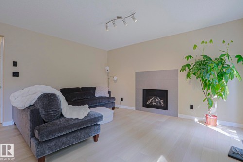 8 Erinwoods Place, St. Albert, AB - Indoor Photo Showing Living Room With Fireplace