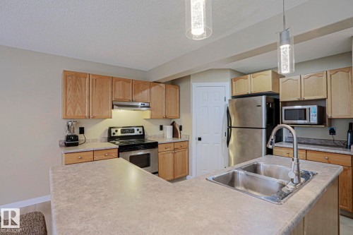 8 Erinwoods Place, St. Albert, AB - Indoor Photo Showing Kitchen With Double Sink