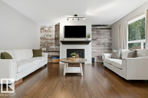 41 Ashton Gate, Spruce Grove, AB - Indoor Photo Showing Living Room With Fireplace