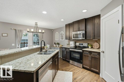 41 Ashton Gate, Spruce Grove, AB - Indoor Photo Showing Kitchen With Stainless Steel Kitchen With Double Sink