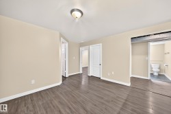 Wood-finish flooring with neutral wall tones - 