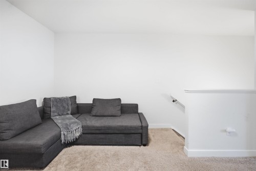 3877 Chrustawka Place Sw, Edmonton, AB - Indoor Photo Showing Living Room