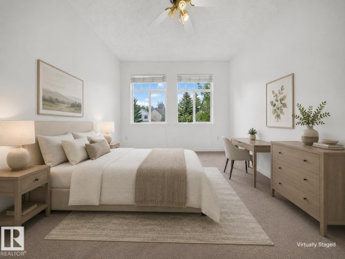 Carpeted flooring, dual windows, and a ceiling fan - #47 30 Levasseur Rd, St. Albert, AB - Indoor Photo Showing Bedroom