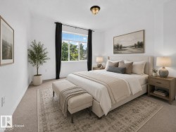 Recessed window with dark drapery panels, light-colored walls, and a semi-flush mount ceiling light - 