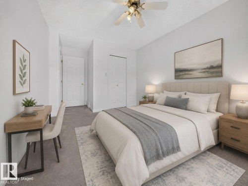 Recessed lighting, ceiling fan, and carpeted flooring - #47 30 Levasseur Rd, St. Albert, AB - Indoor Photo Showing Bedroom