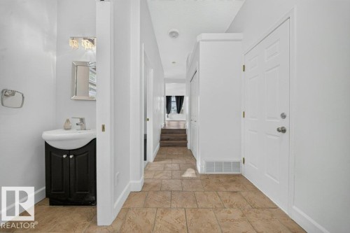 Light-toned tile flooring throughout - #47 30 Levasseur Rd, St. Albert, AB - Indoor Photo Showing Other Room