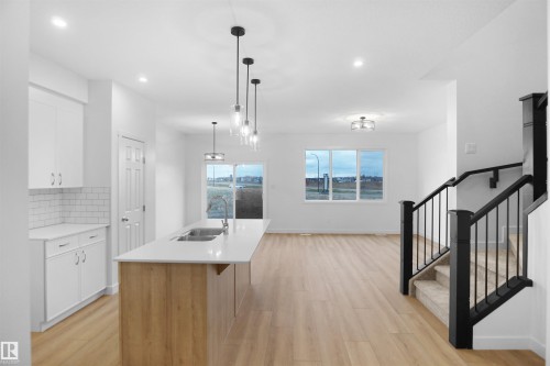 19446 22A Avenue Nw, Edmonton, AB - Indoor Photo Showing Kitchen With Double Sink