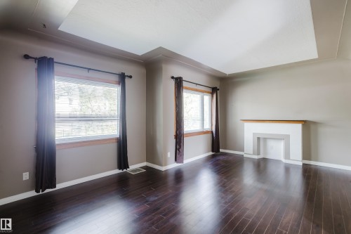 12811 117 Avenue Nw, Edmonton, AB - Indoor Photo Showing Other Room With Fireplace