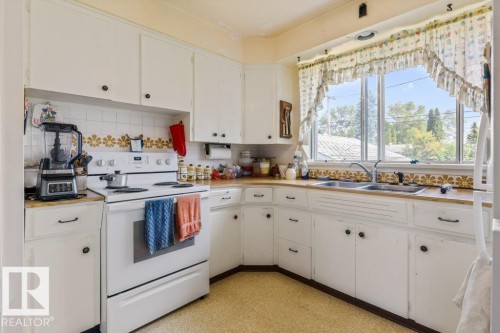 10731 148 Street Nw, Edmonton, AB - Indoor Photo Showing Kitchen With Double Sink