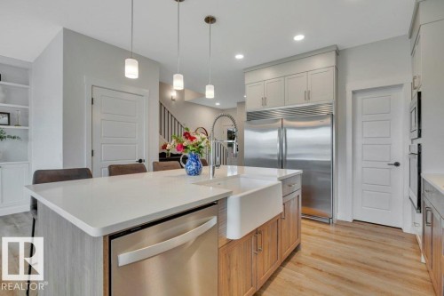 With corner pantry - 5329 Lark Landing Nw, Edmonton, AB - Indoor Photo Showing Kitchen With Upgraded Kitchen