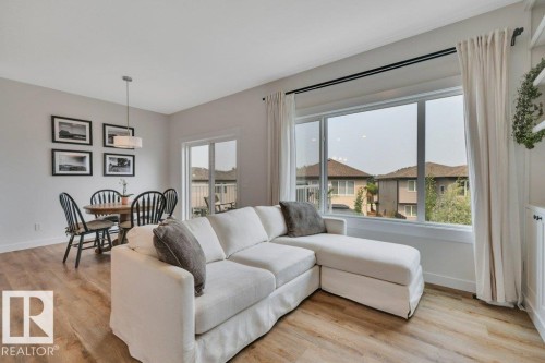 Overlooking bright dining nook - 5329 Lark Landing Nw, Edmonton, AB - Indoor Photo Showing Living Room