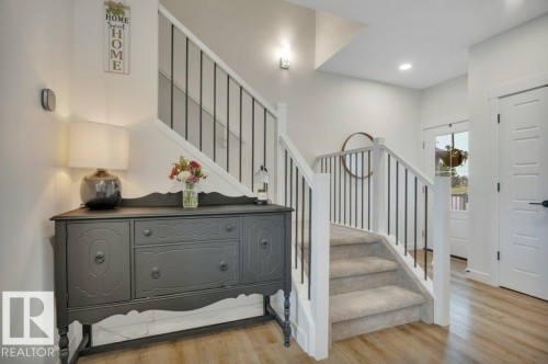 Leading to second floor - 5329 Lark Landing Nw, Edmonton, AB - Indoor Photo Showing Other Room