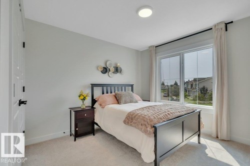 Bedroom 3 - 5329 Lark Landing Nw, Edmonton, AB - Indoor Photo Showing Bedroom