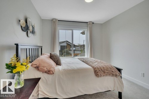 Bedroom 3 - 5329 Lark Landing Nw, Edmonton, AB - Indoor Photo Showing Bedroom