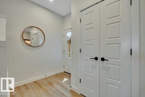 With closet at front entry - 5329 Lark Landing Nw, Edmonton, AB - Indoor Photo Showing Other Room