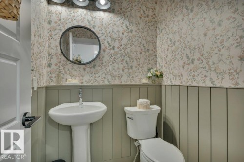 Mainfloor 2-pc powder room - 5329 Lark Landing Nw, Edmonton, AB - Indoor Photo Showing Bathroom