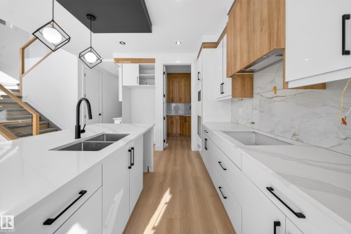 8512 Mayday Run Sw, Edmonton, AB - Indoor Photo Showing Kitchen With Double Sink With Upgraded Kitchen