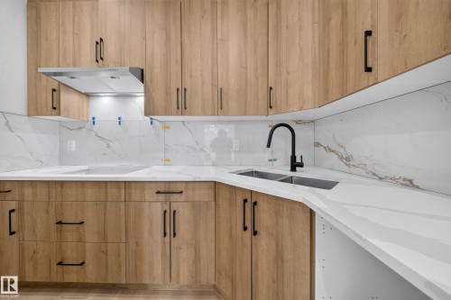 8512 Mayday Run Sw, Edmonton, AB - Indoor Photo Showing Kitchen With Double Sink