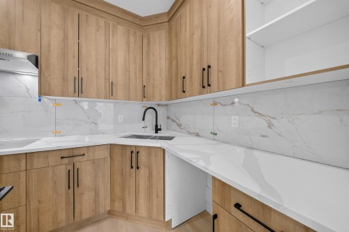 8512 Mayday Run Sw, Edmonton, AB - Indoor Photo Showing Kitchen With Double Sink