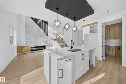 8512 Mayday Run Sw, Edmonton, AB - Indoor Photo Showing Kitchen With Double Sink