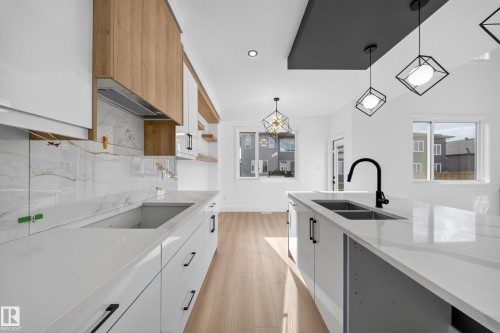 8512 Mayday Run Sw, Edmonton, AB - Indoor Photo Showing Kitchen With Double Sink With Upgraded Kitchen