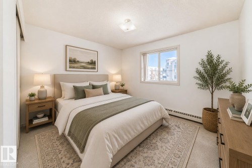 Virtually staged - #320 9620 174 St Nw, Edmonton, AB - Indoor Photo Showing Bedroom
