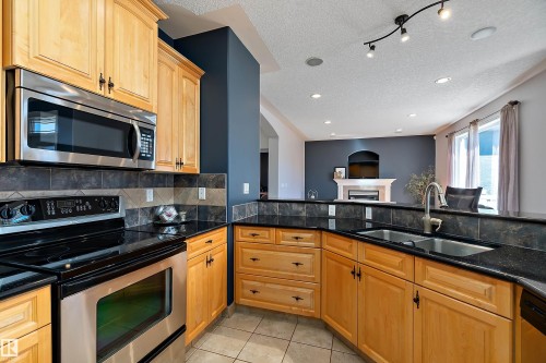 17807 111 Street Nw, Edmonton, AB - Indoor Photo Showing Kitchen With Double Sink