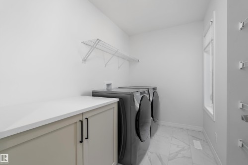 3249 Dixon Way Sw, Edmonton, AB - Indoor Photo Showing Laundry Room