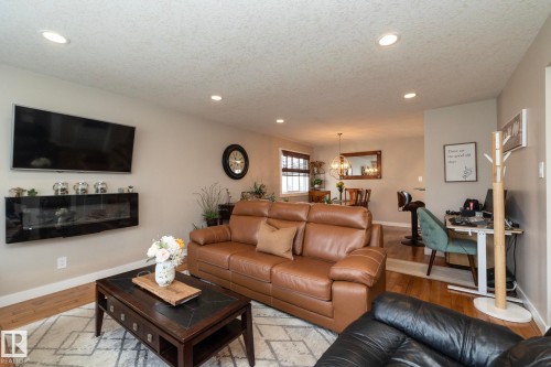 10623 75 Street Nw, Edmonton, AB - Indoor Photo Showing Living Room With Fireplace
