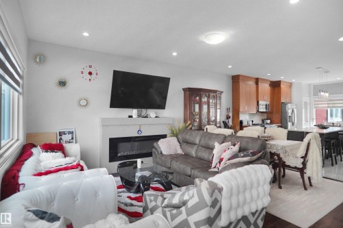 #46 2803 14 Av Nw, Edmonton, AB - Indoor Photo Showing Living Room With Fireplace