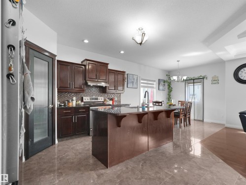 16903 54 Street Nw, Edmonton, AB - Indoor Photo Showing Kitchen With Upgraded Kitchen