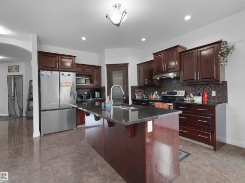 16903 54 Street Nw, Edmonton, AB - Indoor Photo Showing Kitchen With Double Sink