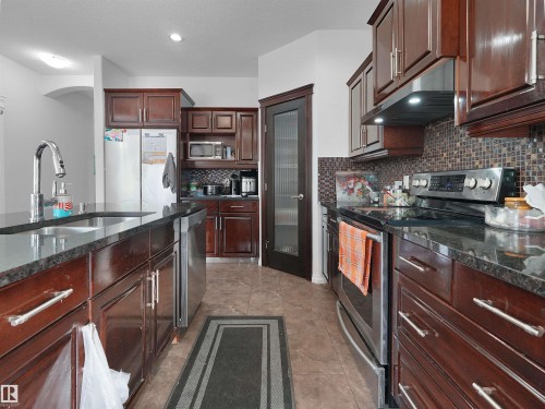 16903 54 Street Nw, Edmonton, AB - Indoor Photo Showing Kitchen With Double Sink With Upgraded Kitchen