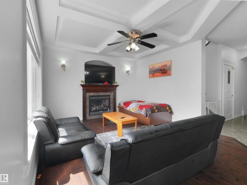 16903 54 Street Nw, Edmonton, AB - Indoor Photo Showing Living Room With Fireplace