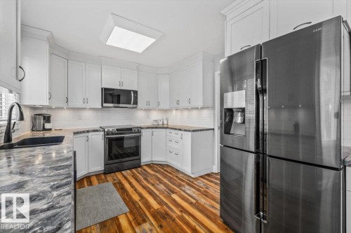 16551 116 Street Nw, Edmonton, AB - Indoor Photo Showing Kitchen With Stainless Steel Kitchen With Double Sink With Upgraded Kitchen