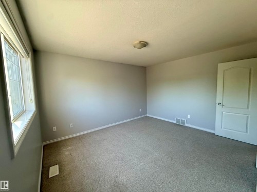 76 Bonin Crescent, Beaumont, AB - Indoor Photo Showing Other Room