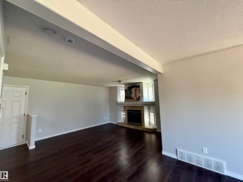 76 Bonin Crescent, Beaumont, AB - Indoor With Fireplace