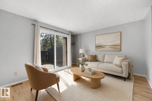 12080 25 Avenue Nw, Edmonton, AB - Indoor Photo Showing Living Room