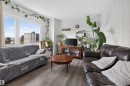 #703 9909 110 St Nw, Edmonton, AB  - Indoor Photo Showing Living Room 