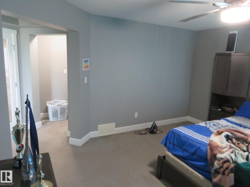 Recessed ceiling fan with integrated lighting - 3233 Winspear Crescent Sw, Edmonton, AB - Indoor Photo Showing Bedroom