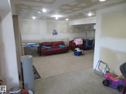 Recessed ceiling lighting, open concept layout, carpeted flooring - 