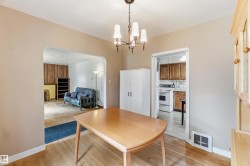 Open archway leading to additional living space - 