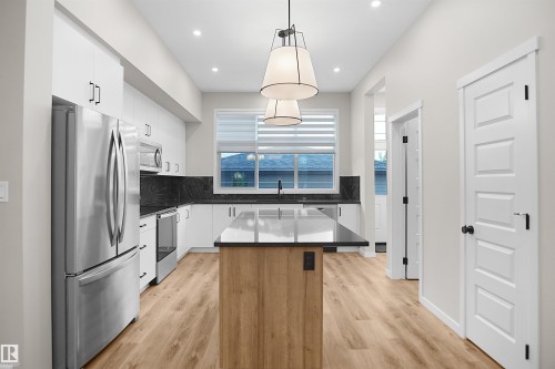 7100 51 Avenue, Beaumont, AB - Indoor Photo Showing Kitchen With Upgraded Kitchen