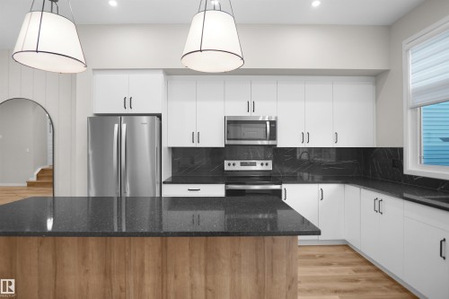 7100 51 Avenue, Beaumont, AB - Indoor Photo Showing Kitchen With Upgraded Kitchen
