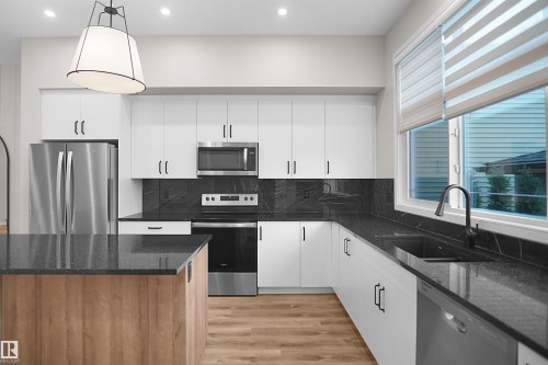7100 51 Avenue, Beaumont, AB - Indoor Photo Showing Kitchen With Upgraded Kitchen