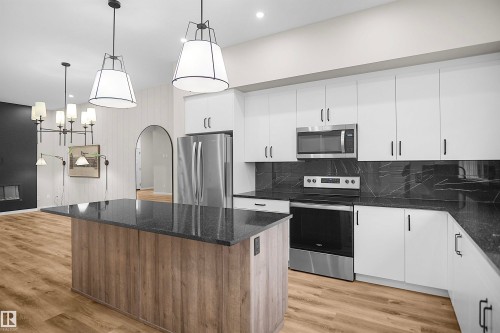 7100 51 Avenue, Beaumont, AB - Indoor Photo Showing Kitchen With Upgraded Kitchen